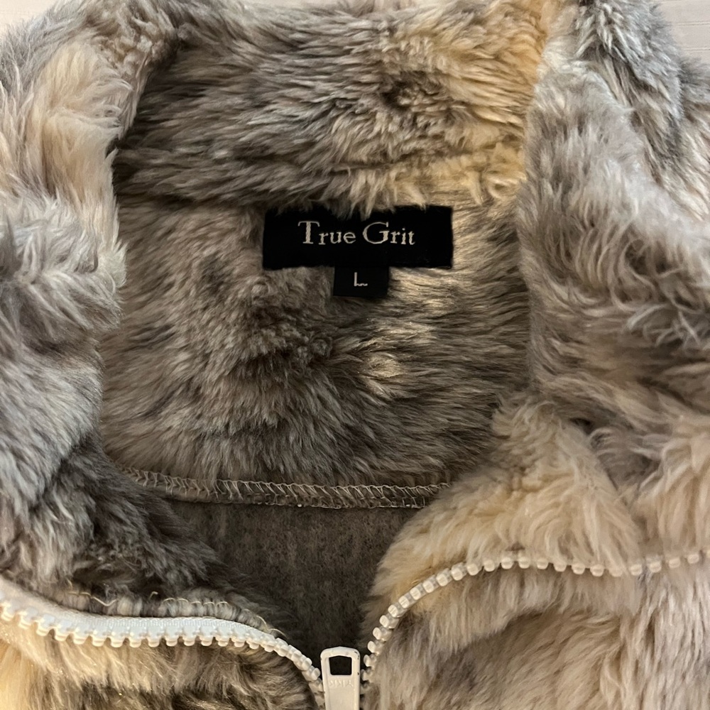 True grit animal print fuzzy animal print vest